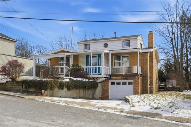 a view of a house with a patio