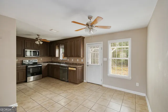 an empty room with fan