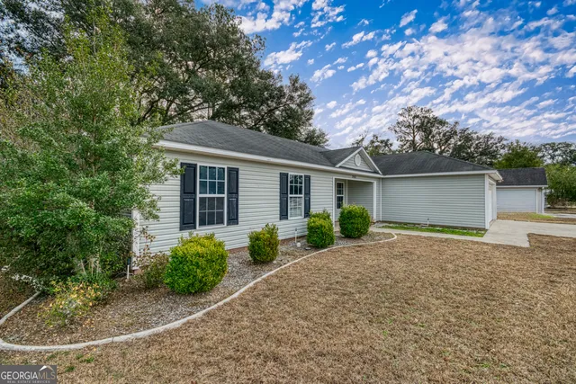front view of house with a yard