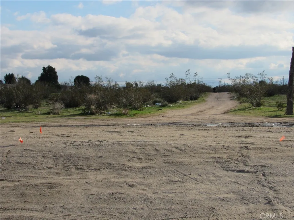 0 Palmdale Road Victorville, CA 92395 - Photo 2 of 4 a view of a beach and a large window