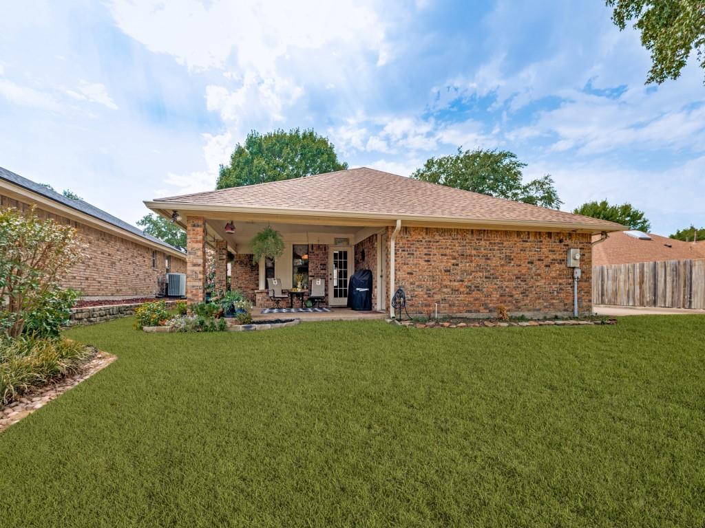 2213 Ridgewood Bedford, TX 76021 - Photo 27 of 40 Lots of backyard space for pets, playtime or throwing a ball.