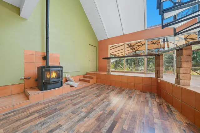 a view of a room with wooden walls