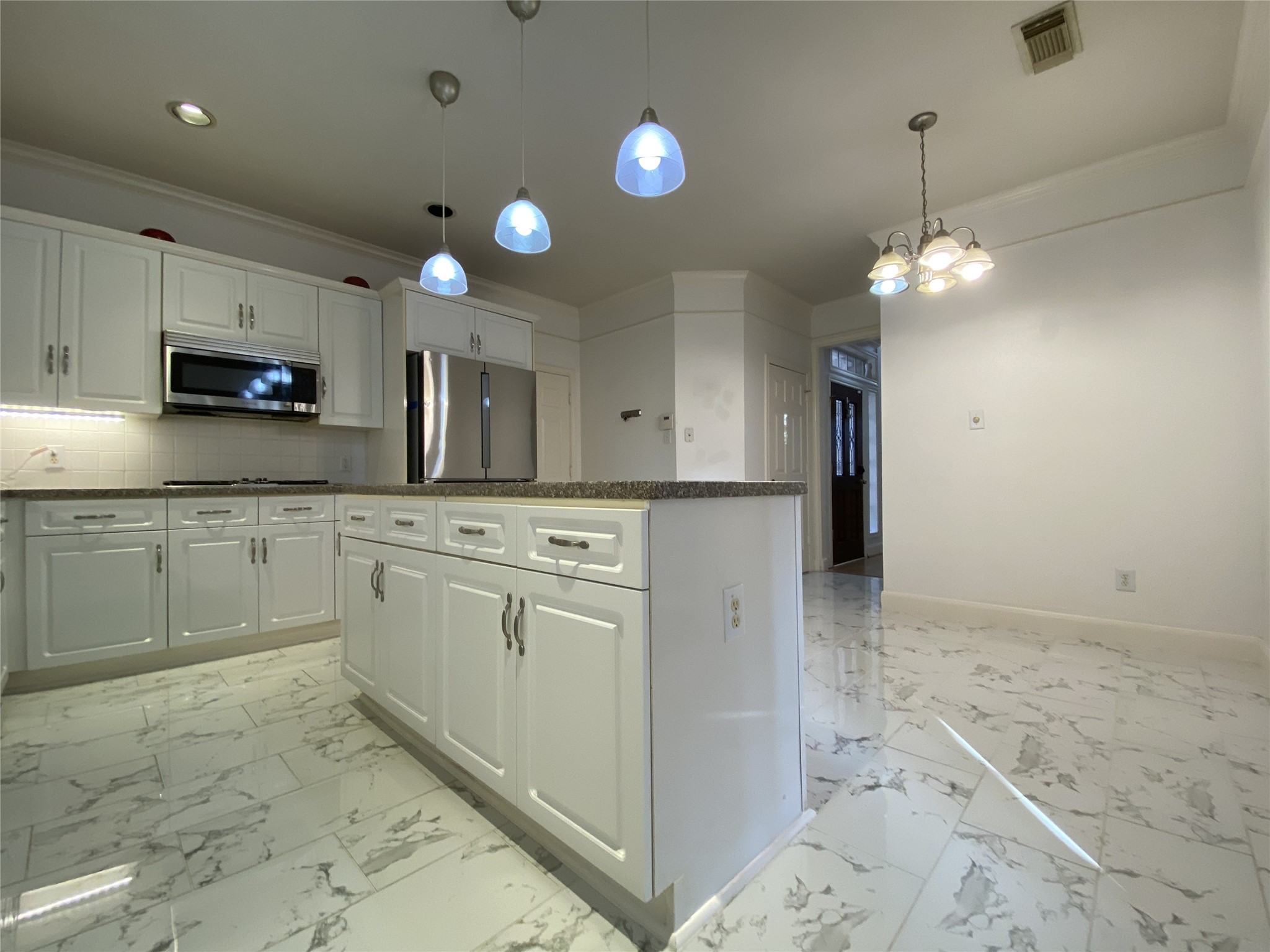 2604 Hopkins Street, Unit 1/2 Houston, TX 77006 - Photo 7 of 26 Is island offers lots of storage space. Past the island is the breakfast room.