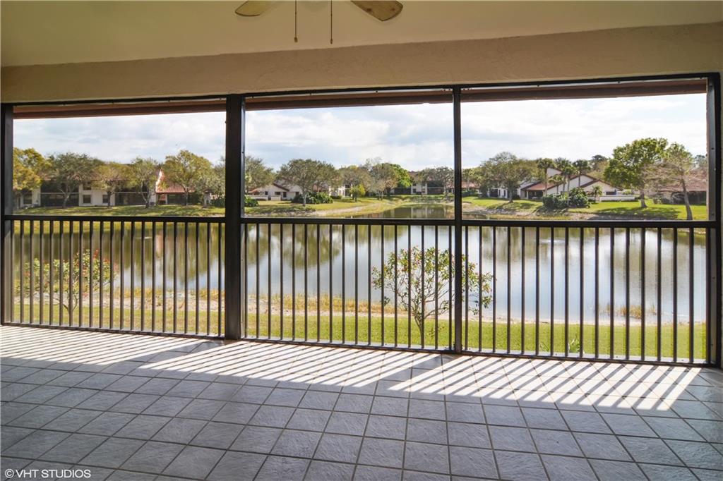 3410 Southeast Martinique Trace, Unit 202 Stuart, FL 34997 - Photo 14 of 15 a view of a street view from a balcony
