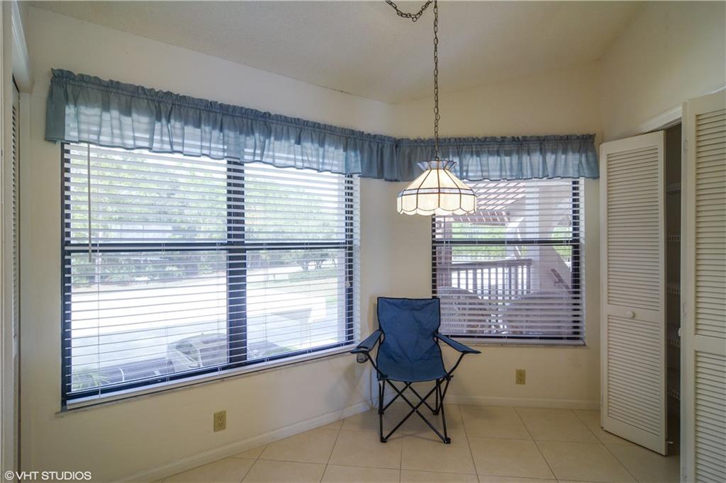 3410 Southeast Martinique Trace, Unit 202 Stuart, FL 34997 - Photo 7 of 15 a view of a room with a large window