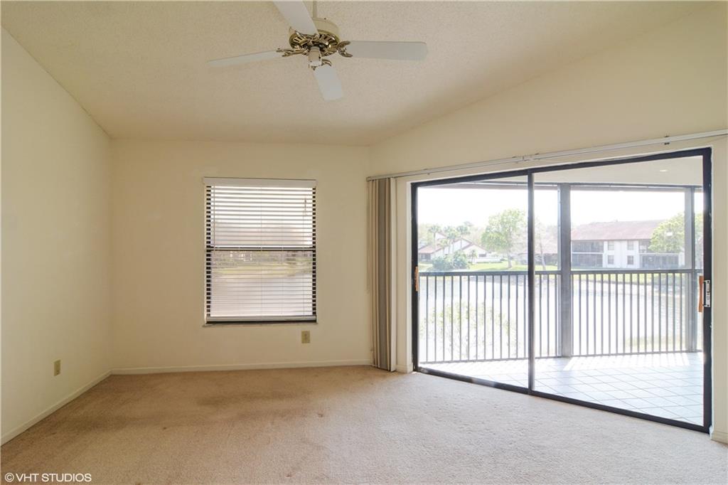 3410 Southeast Martinique Trace, Unit 202 Stuart, FL 34997 - Photo 9 of 15 an empty room with a window