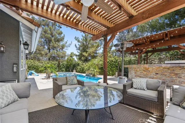 a bathroom with a double vanity sink toilet tub and shower