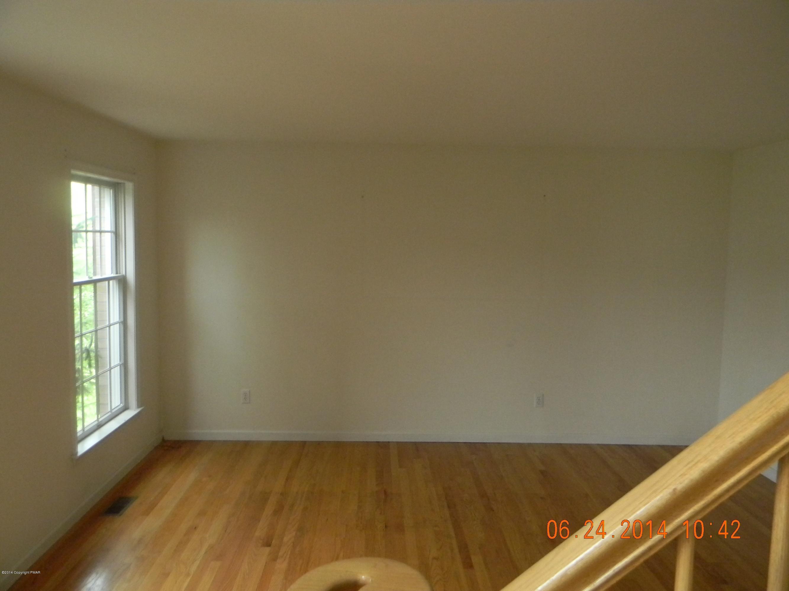 5513 Bridle Road Stroudsburg, PA 18360 - Photo 3 of 15 a view of an empty room and window