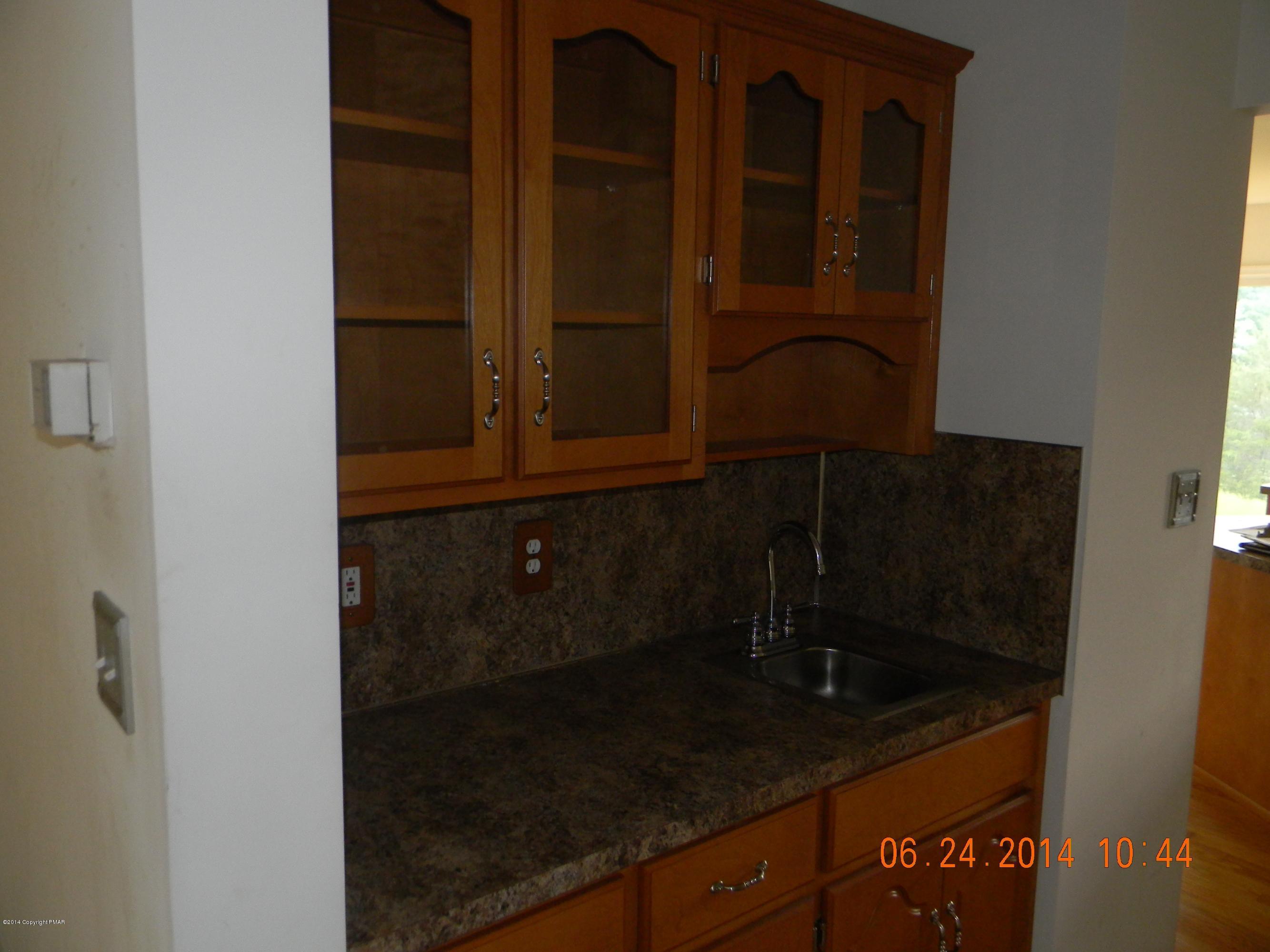5513 Bridle Road Stroudsburg, PA 18360 - Photo 6 of 15 a bathroom with a sink and cabinets