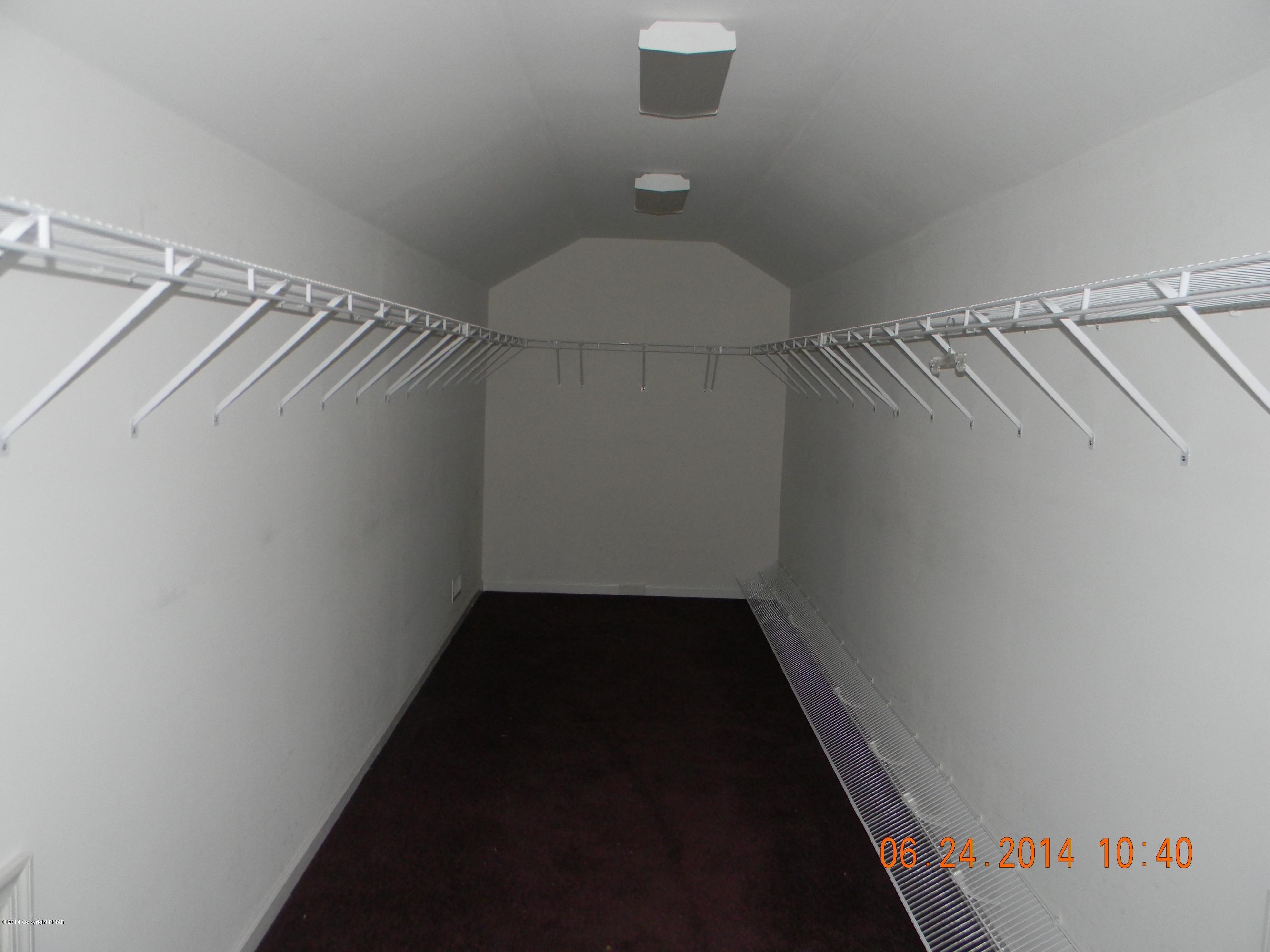 5513 Bridle Road Stroudsburg, PA 18360 - Photo 10 of 15 a close view of walk in closet