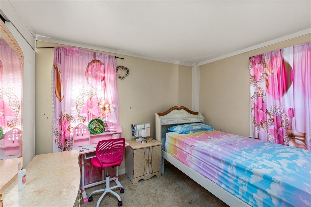 52 Salem Street Reading, MA 01867 - Photo 20 of 26 a bedroom with a bed and furniture