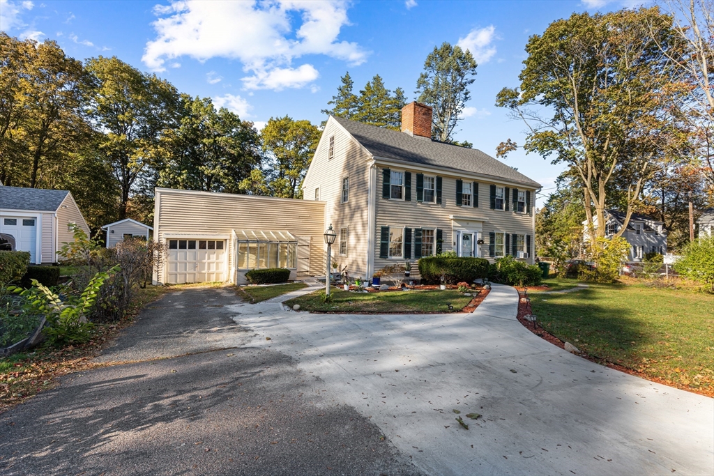 52 Salem Street Reading, MA 01867 - Photo 2 of 26 a view of house with outdoor space and sitting area