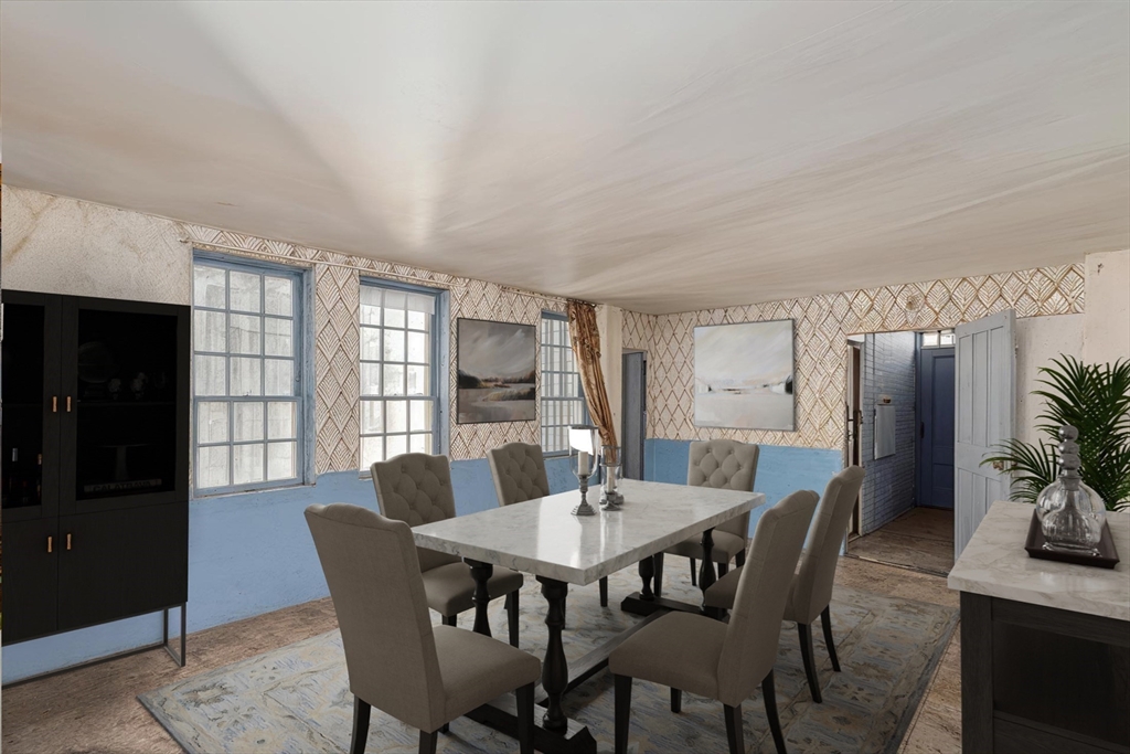 52 Salem Street Reading, MA 01867 - Photo 8 of 26 a view of a dining room with furniture and window