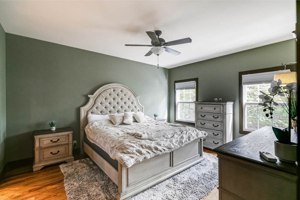 124 Riley Creek Road Tullahoma, TN 37388 - Photo 13 of 30 a bedroom with a bed and a tv