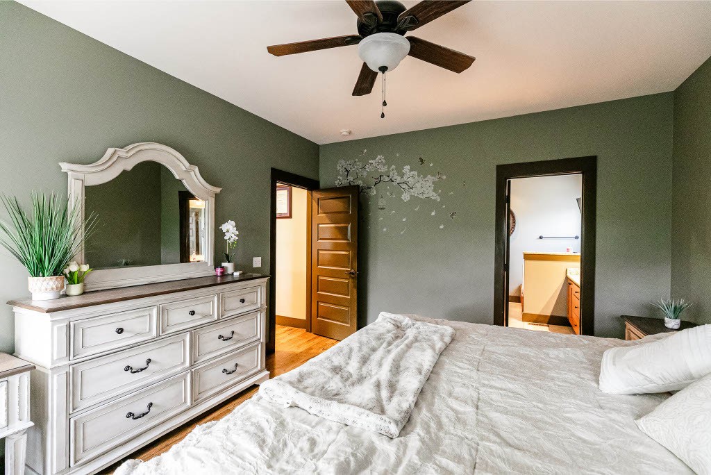 124 Riley Creek Road Tullahoma, TN 37388 - Photo 14 of 30 a bedroom with a bed and a dresser