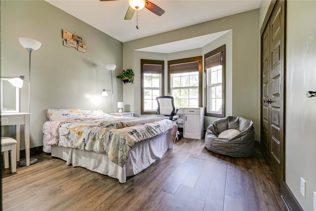 124 Riley Creek Road Tullahoma, TN 37388 - Photo 20 of 30 a bedroom with a bed and a couch