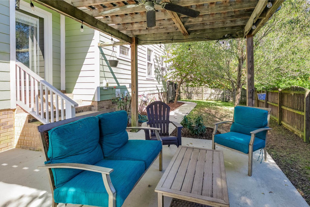 124 Riley Creek Road Tullahoma, TN 37388 - Photo 25 of 30 a balcony with furniture and a garden
