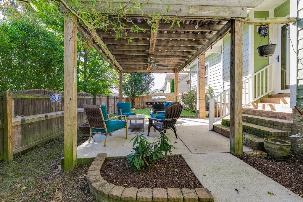 124 Riley Creek Road Tullahoma, TN 37388 - Photo 26 of 30 a building outdoor space with patio furniture and potted plants