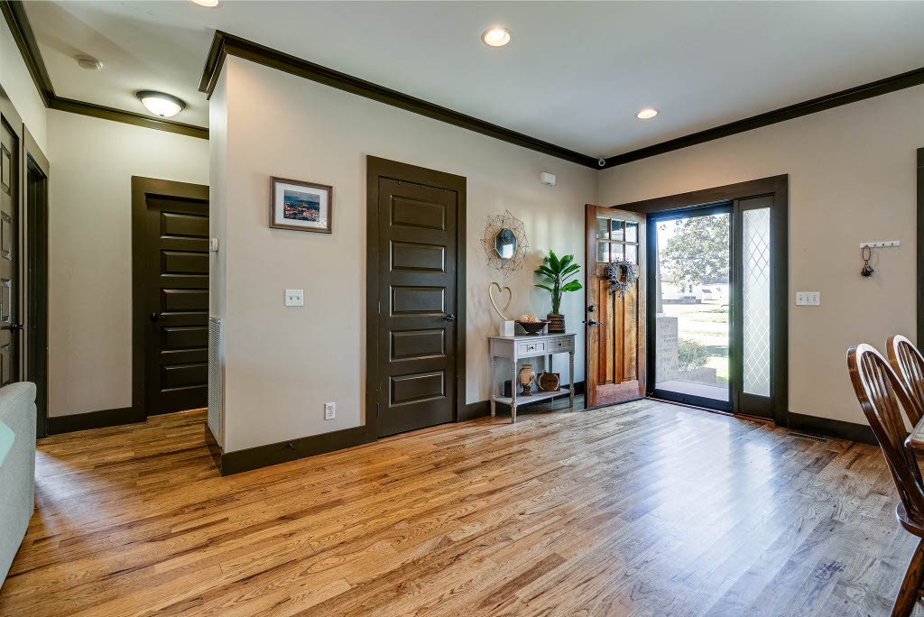 124 Riley Creek Road Tullahoma, TN 37388 - Photo 4 of 30 a view of an empty room with window and wooden floor