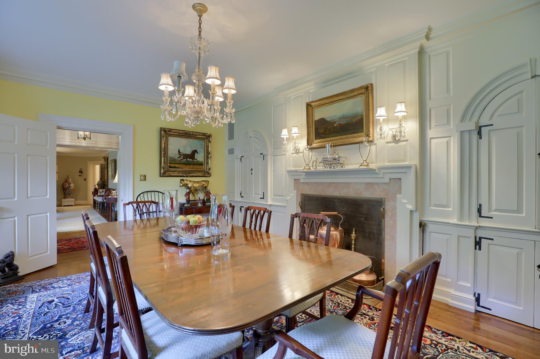 140 Evans Hill Road Reading, PA 19608 - Photo 14 of 70 a view of a dining room with furniture wooden floor and a chandelier