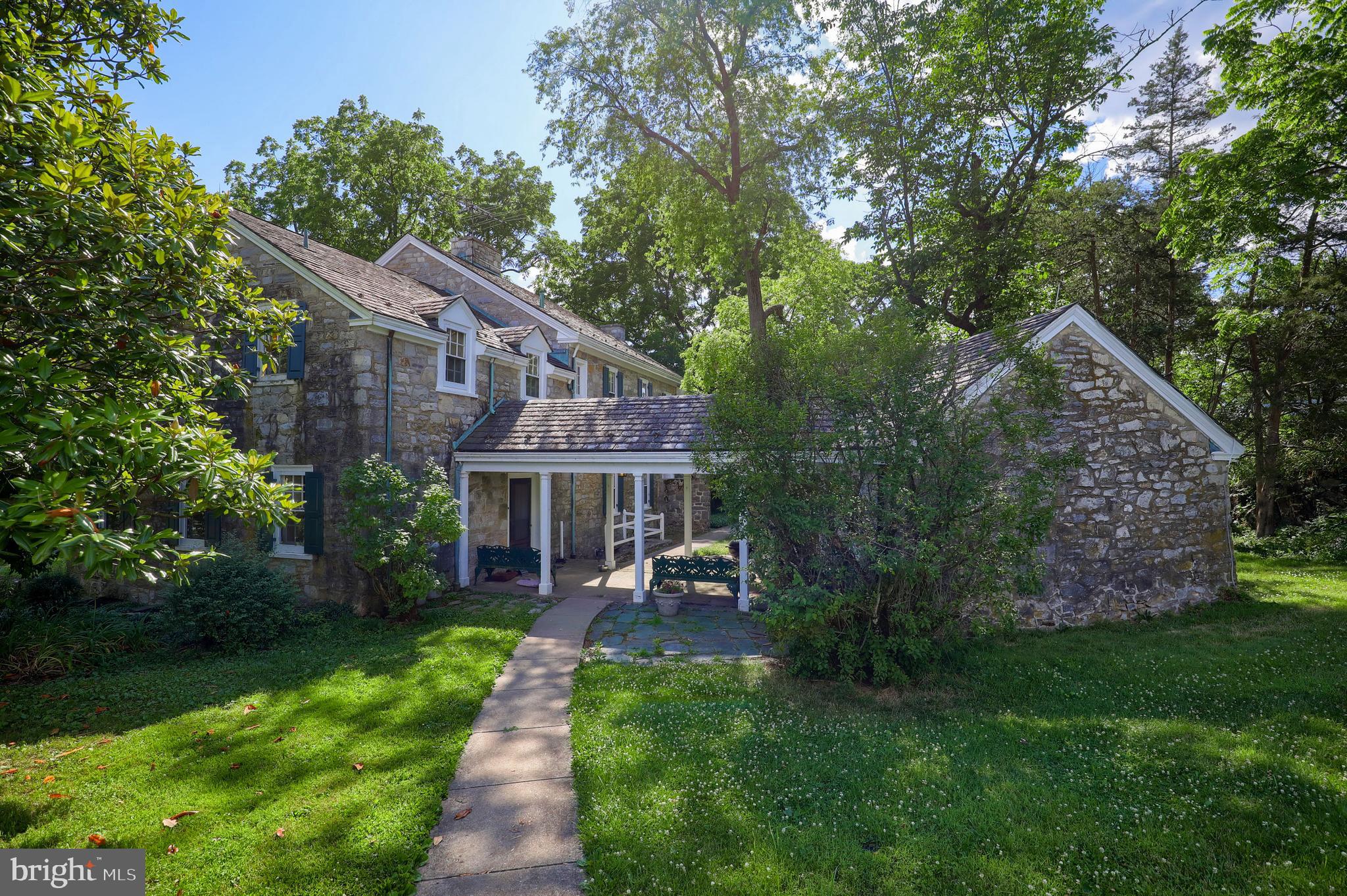140 Evans Hill Road Reading, PA 19608 - Photo 33 of 70 a view of a house with backyard porch and garden