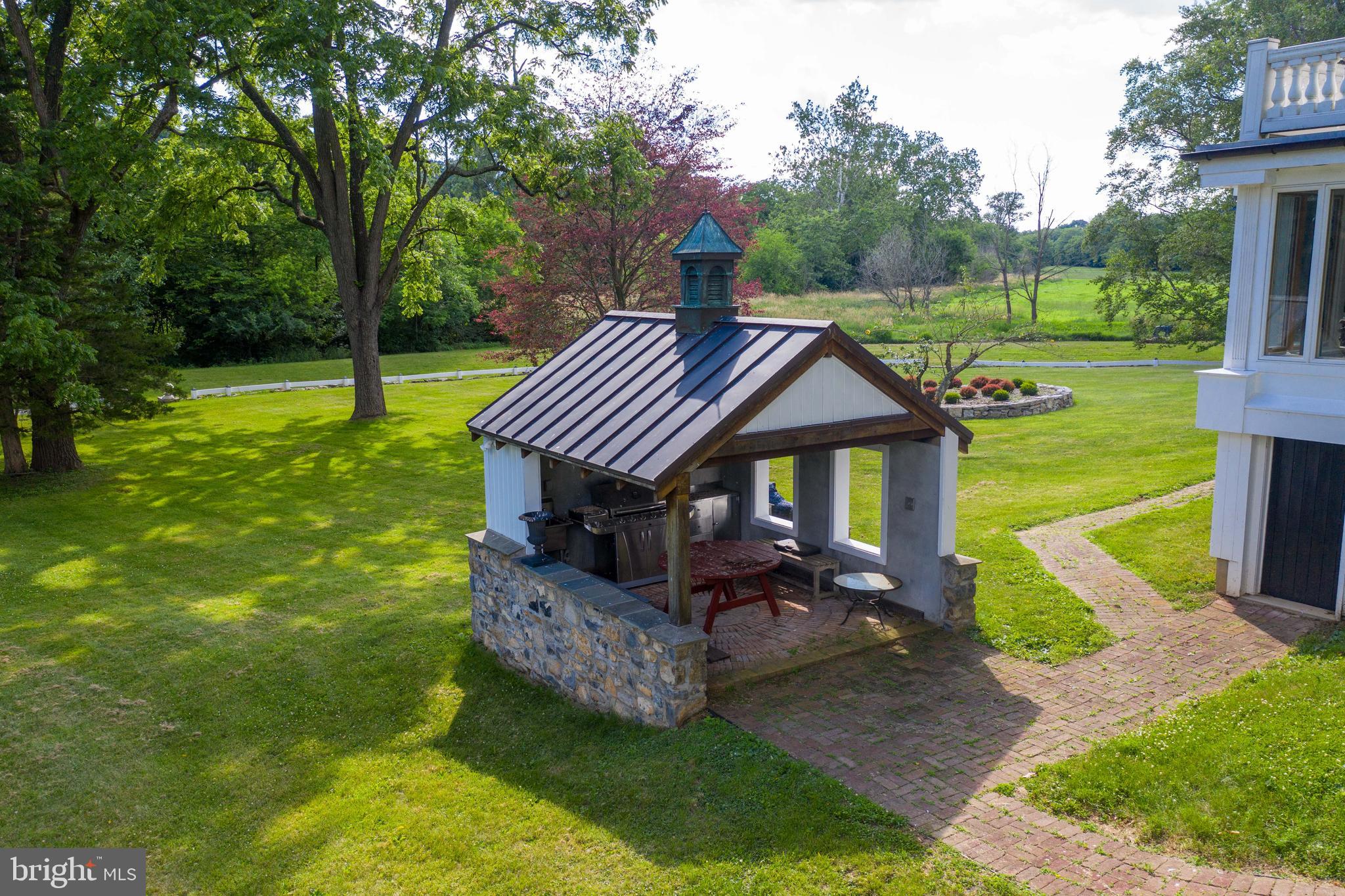 140 Evans Hill Road Reading, PA 19608 - Photo 51 of 70 a view of a house with a yard deck and a slide