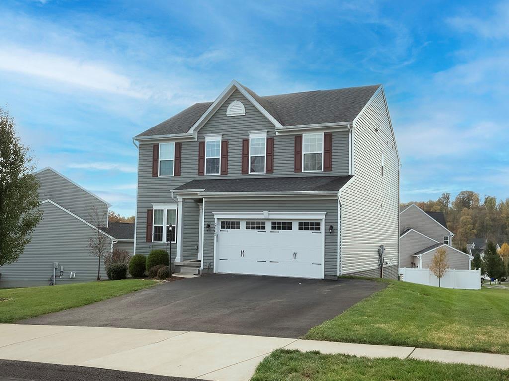 2002 Bald Eagle Court Valencia, PA 16059 - Photo 2 of 42 a front view of a house with a yard