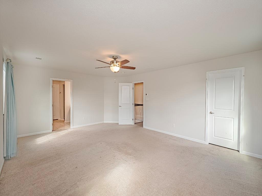 2002 Bald Eagle Court Valencia, PA 16059 - Photo 23 of 42 a view of an empty room with a chandelier fan