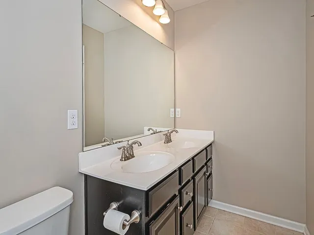 a bathroom with a sink and a toilet