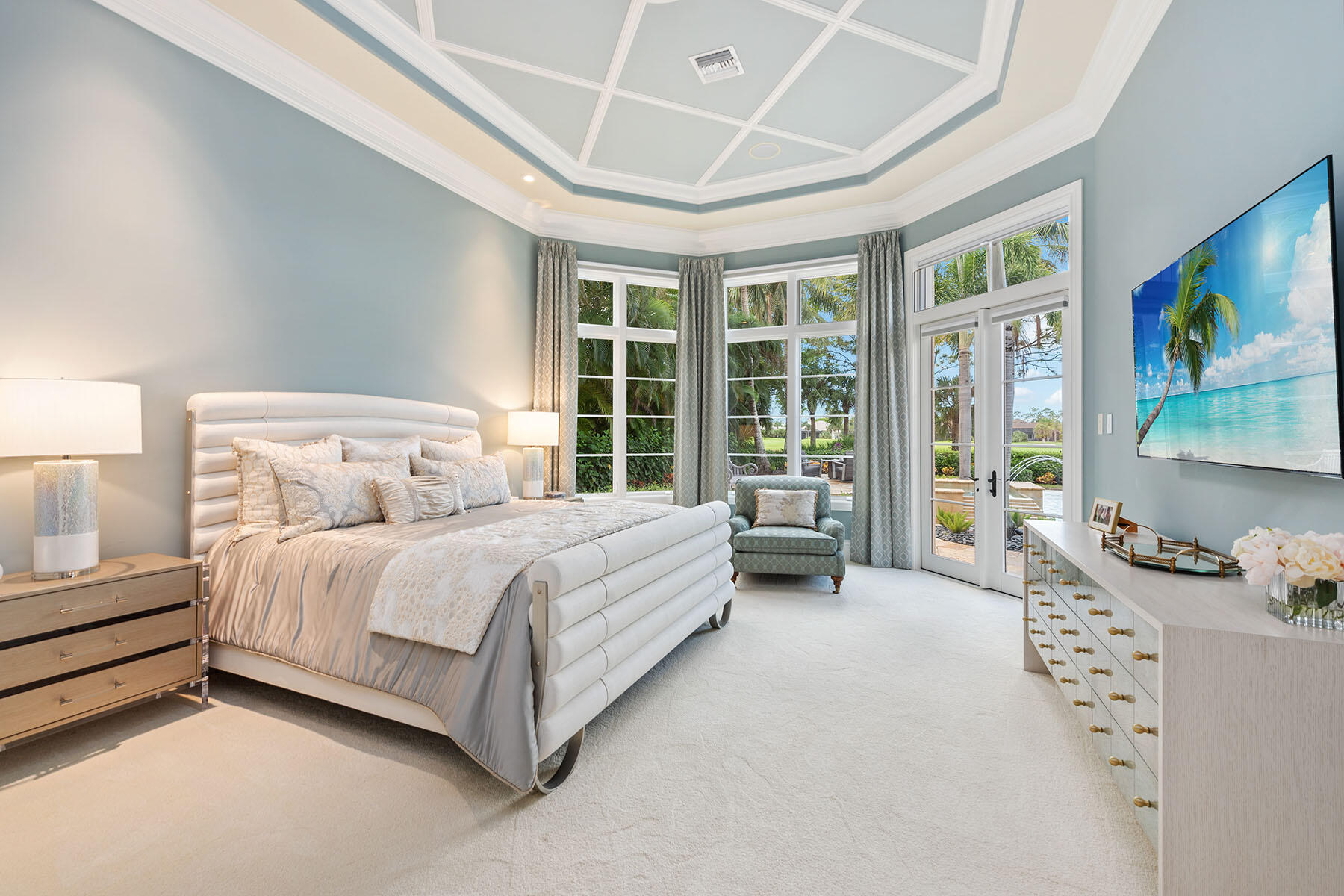 3855 Isla Del Sol Way Naples, FL 34114 - Photo 17 of 50 a large bed sitting in a bedroom next to a window