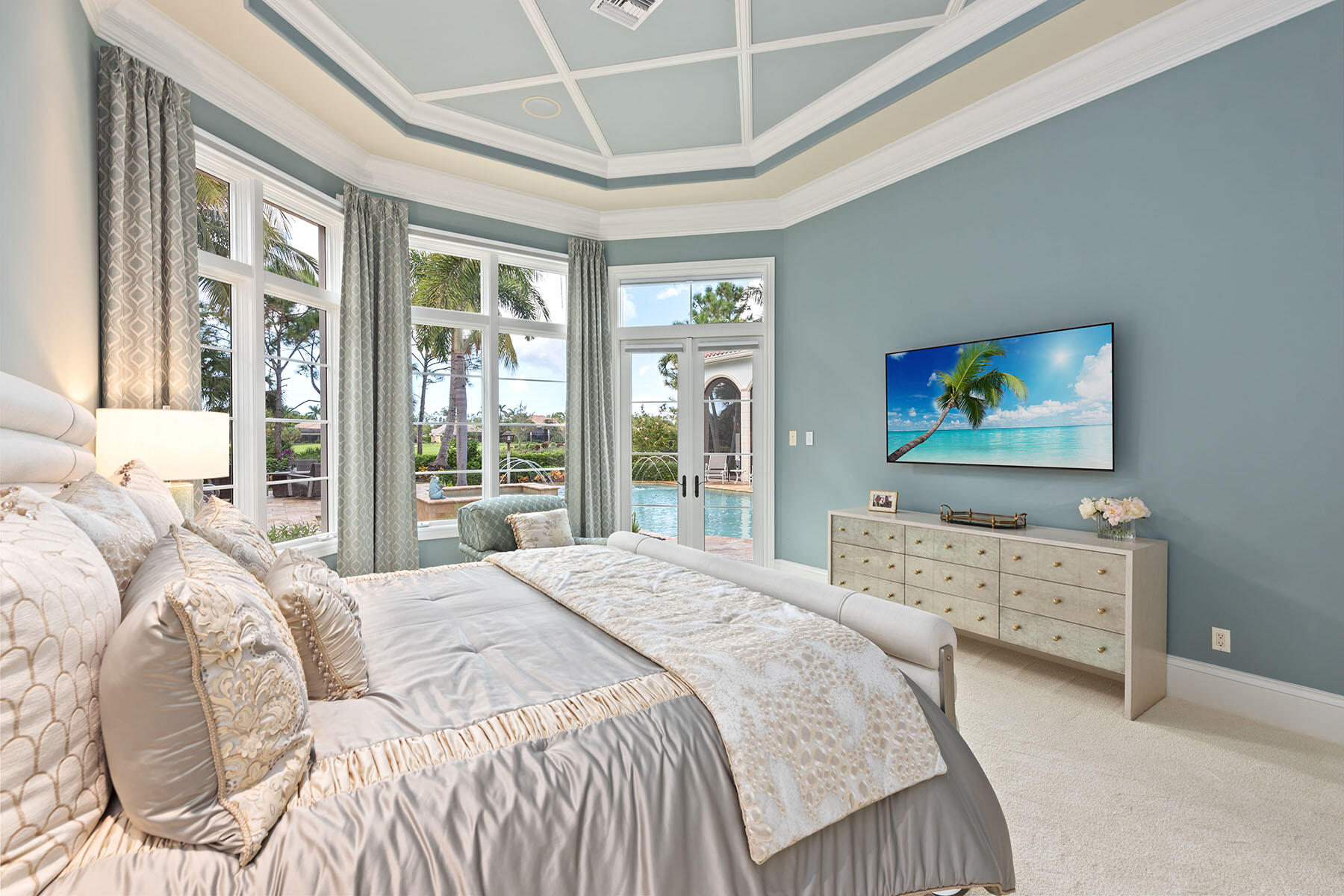 3855 Isla Del Sol Way Naples, FL 34114 - Photo 18 of 50 a bedroom with a bed and a large window