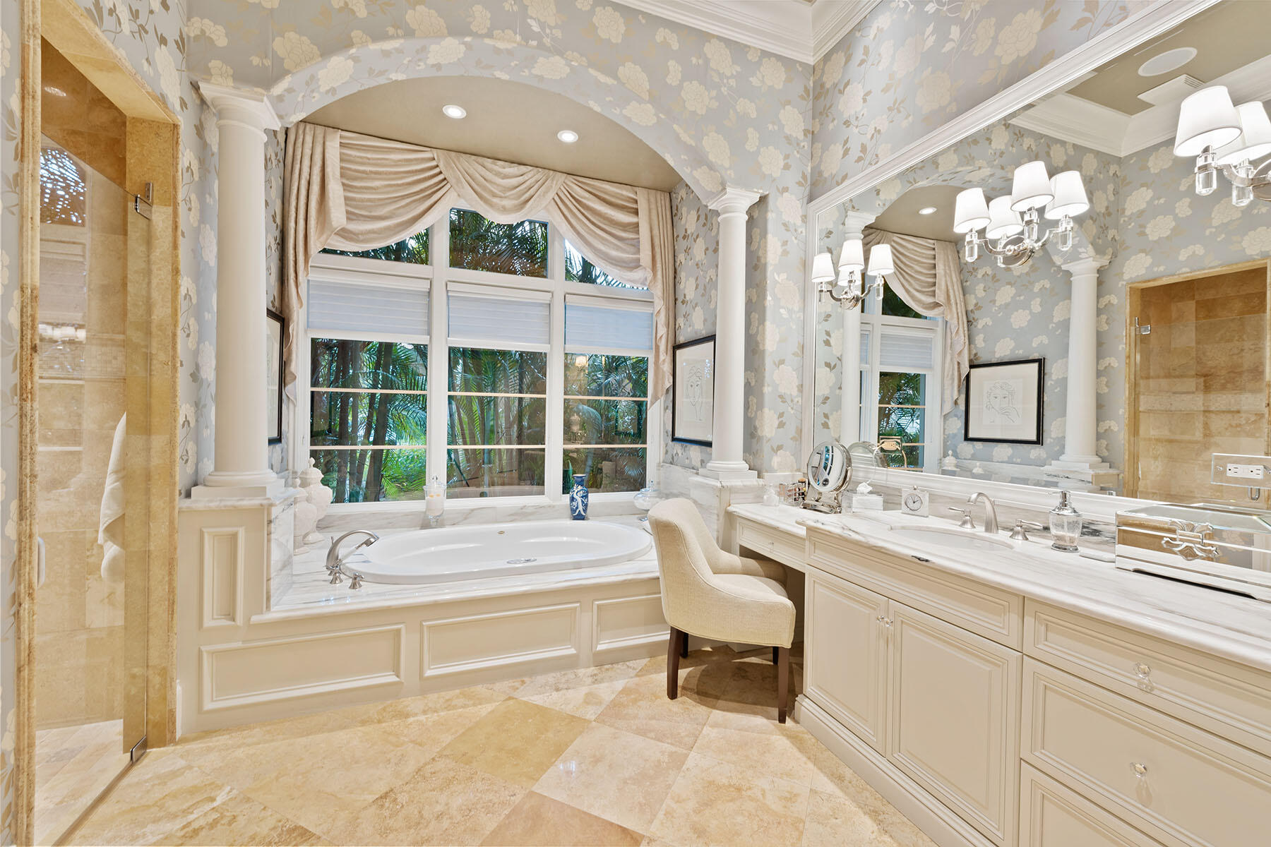 3855 Isla Del Sol Way Naples, FL 34114 - Photo 20 of 50 a spacious bathroom with a tub sink and a large mirror