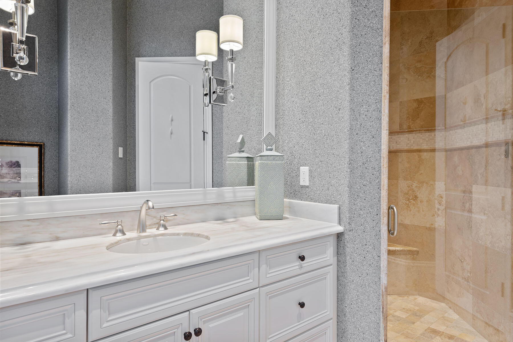 3855 Isla Del Sol Way Naples, FL 34114 - Photo 21 of 50 a bathroom with a sink double vanity and shower