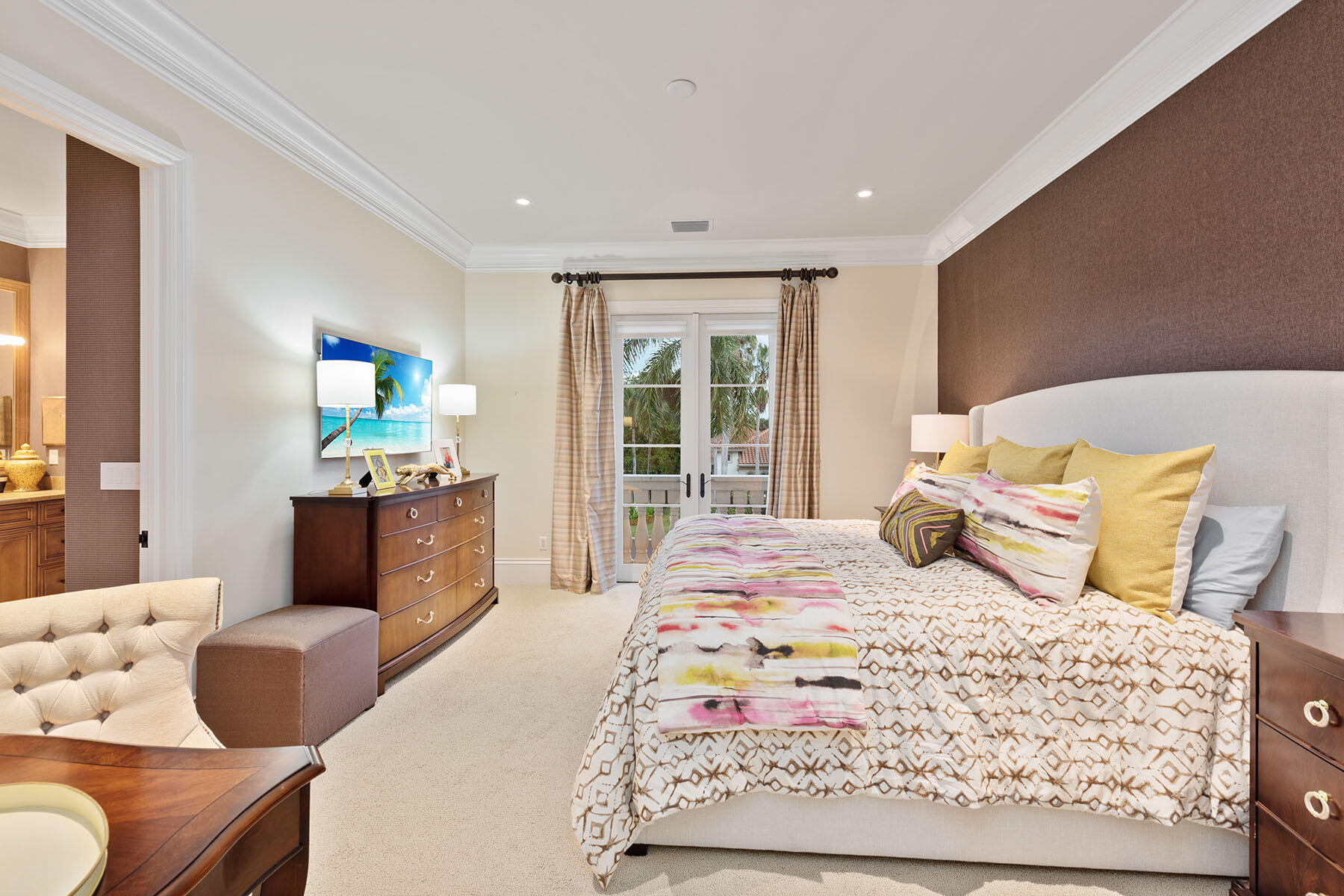 3855 Isla Del Sol Way Naples, FL 34114 - Photo 22 of 50 a bedroom with a bed and wooden floor