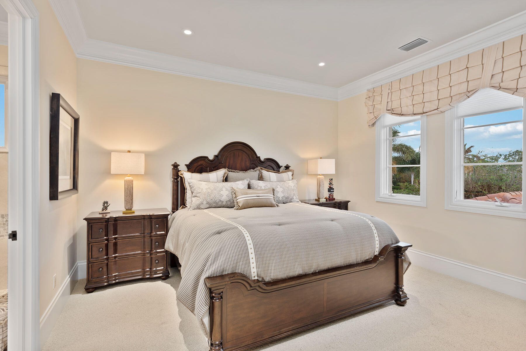 3855 Isla Del Sol Way Naples, FL 34114 - Photo 27 of 50 a bedroom with a bed and window