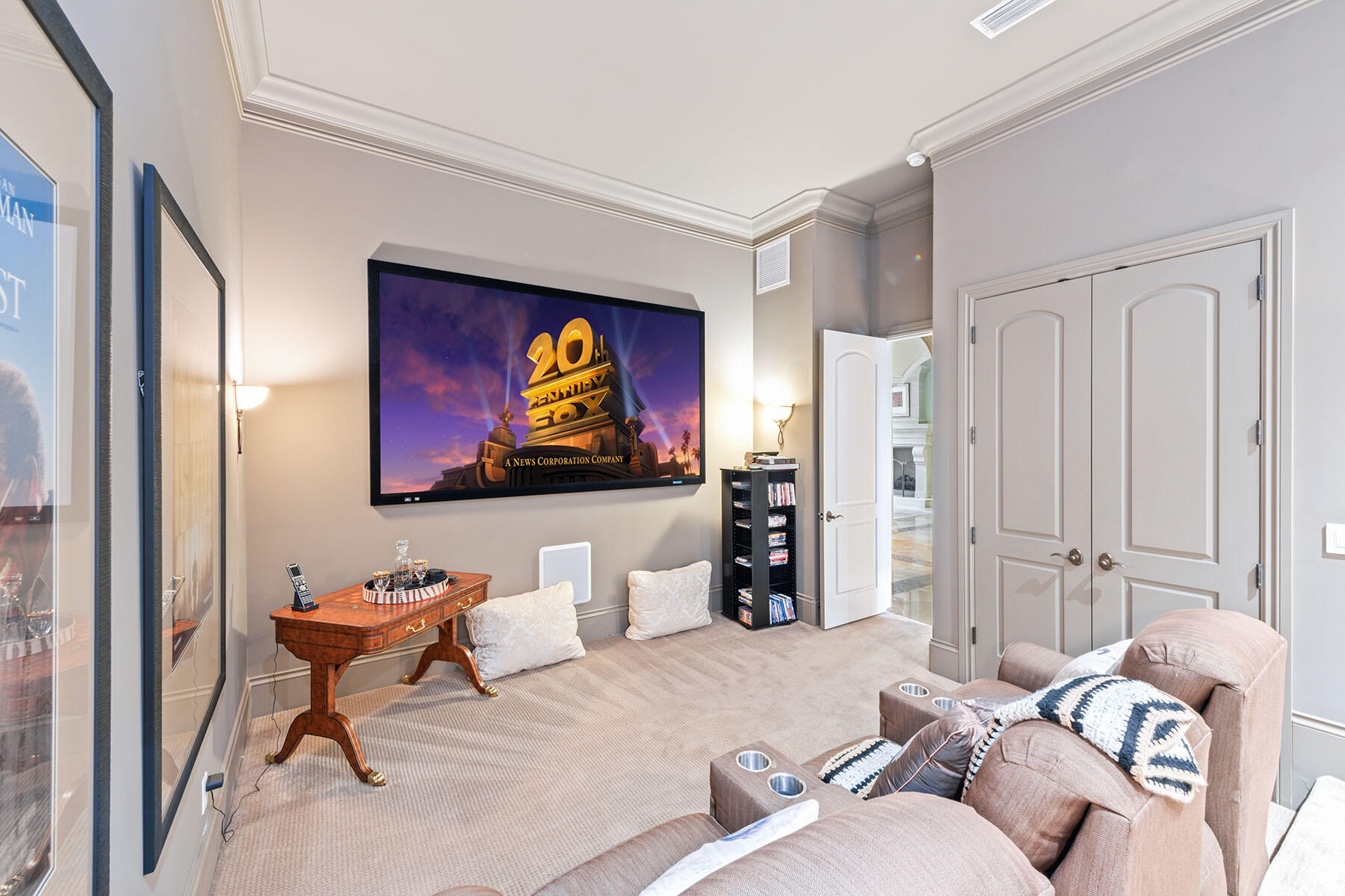 3855 Isla Del Sol Way Naples, FL 34114 - Photo 30 of 50 a living room with furniture a rug and a flat screen tv