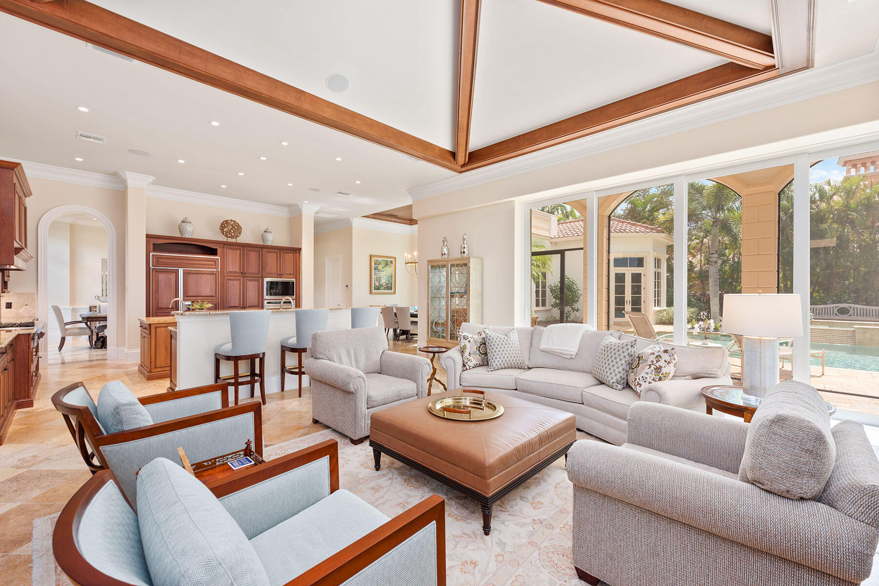 3855 Isla Del Sol Way Naples, FL 34114 - Photo 33 of 50 a living room with furniture and a large window