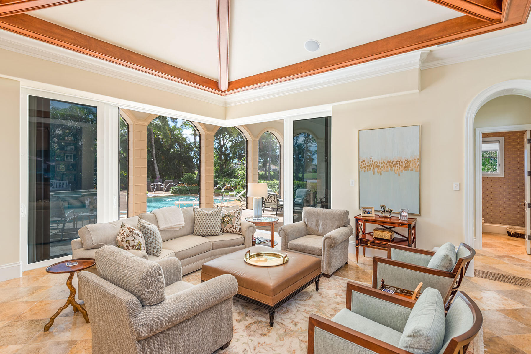 3855 Isla Del Sol Way Naples, FL 34114 - Photo 34 of 50 a living room with furniture and a large window