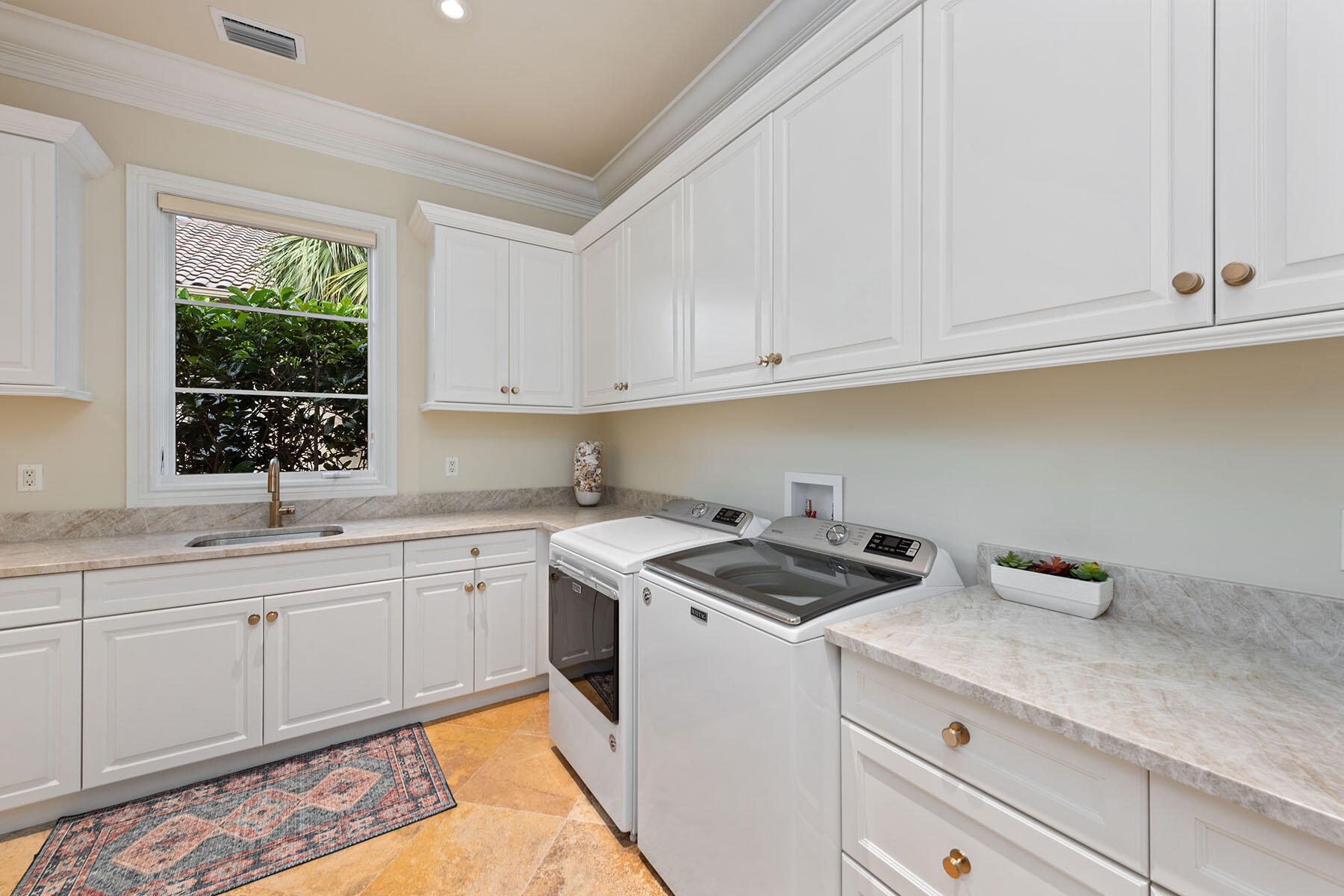 3855 Isla Del Sol Way Naples, FL 34114 - Photo 37 of 50 a kitchen with sink cabinets and window