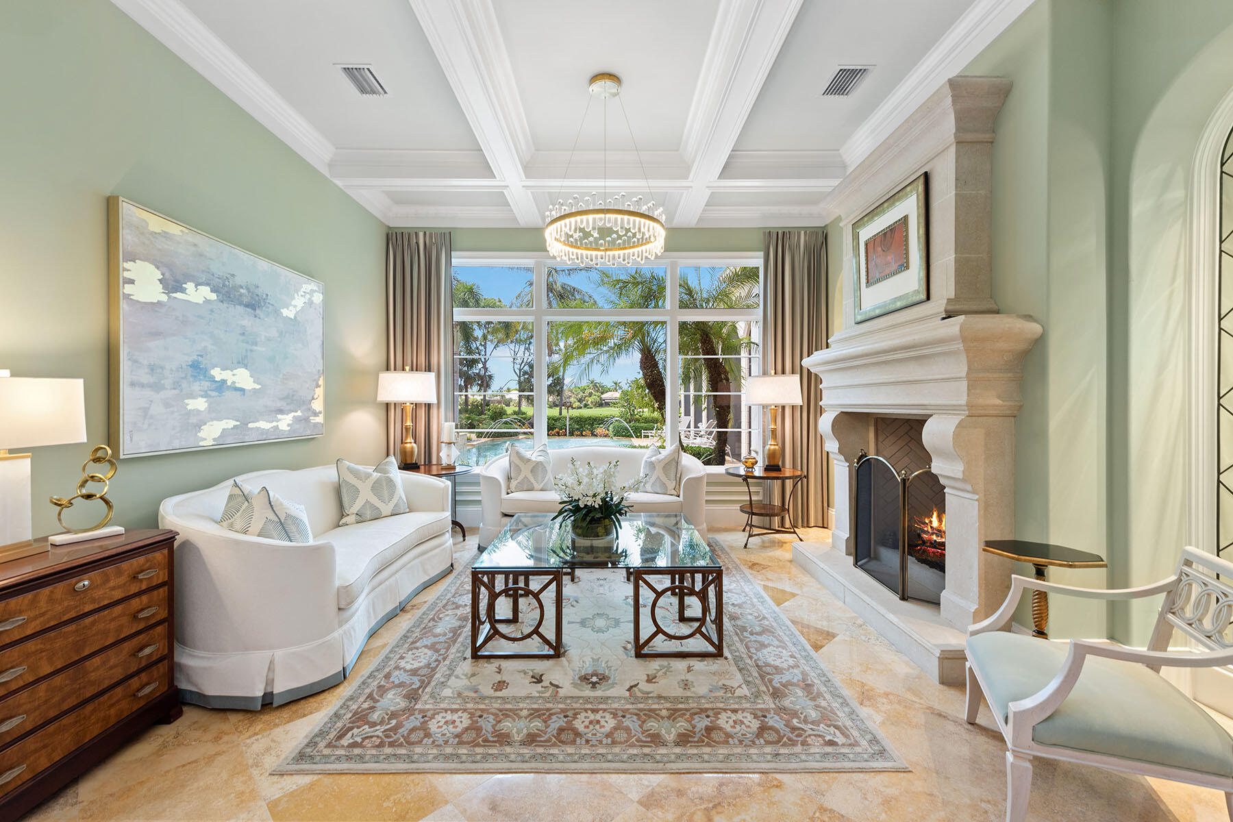 3855 Isla Del Sol Way Naples, FL 34114 - Photo 4 of 50 a living room with fireplace furniture and a large window