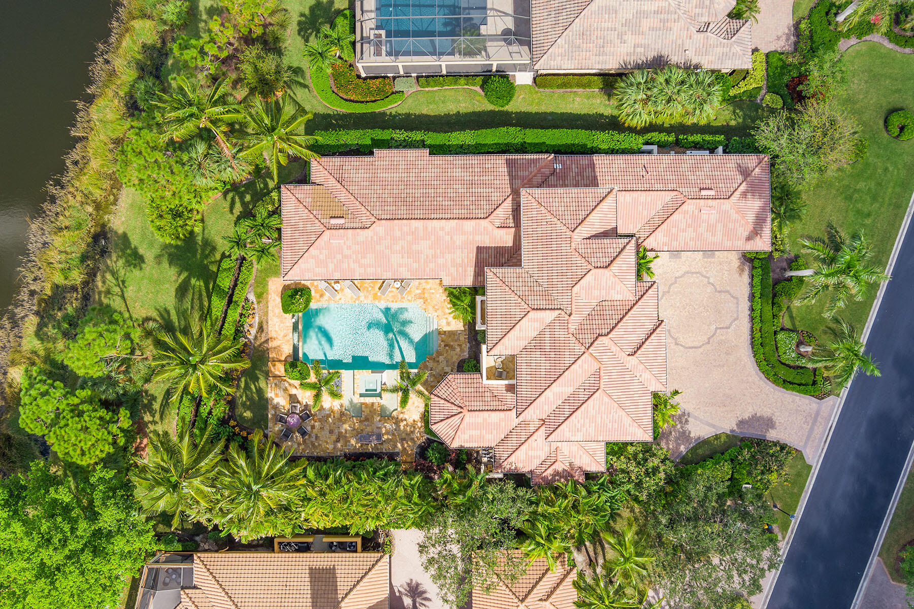 3855 Isla Del Sol Way Naples, FL 34114 - Photo 46 of 50 an aerial view of a house with a garden and plants
