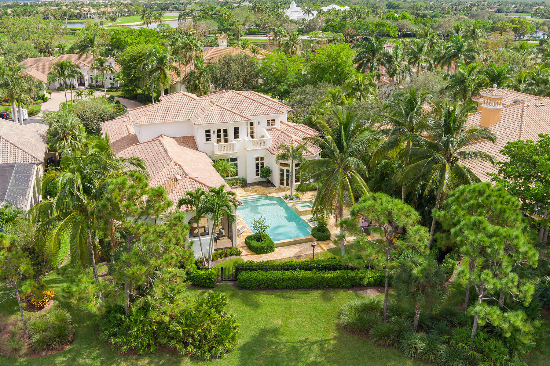 3855 Isla Del Sol Way Naples, FL 34114 - Photo 47 of 50 an aerial view of residential houses with outdoor space and trees