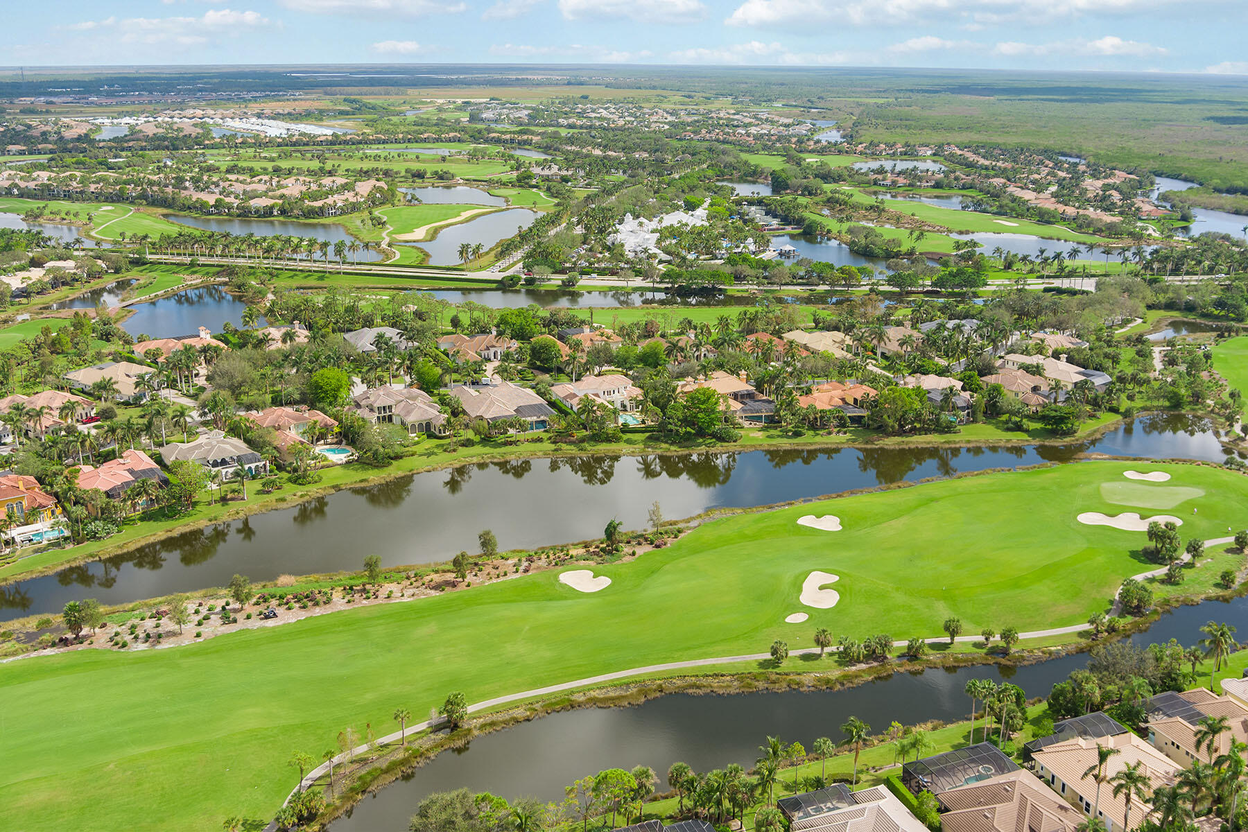 3855 Isla Del Sol Way Naples, FL 34114 - Photo 50 of 50 a view of a lake with a city