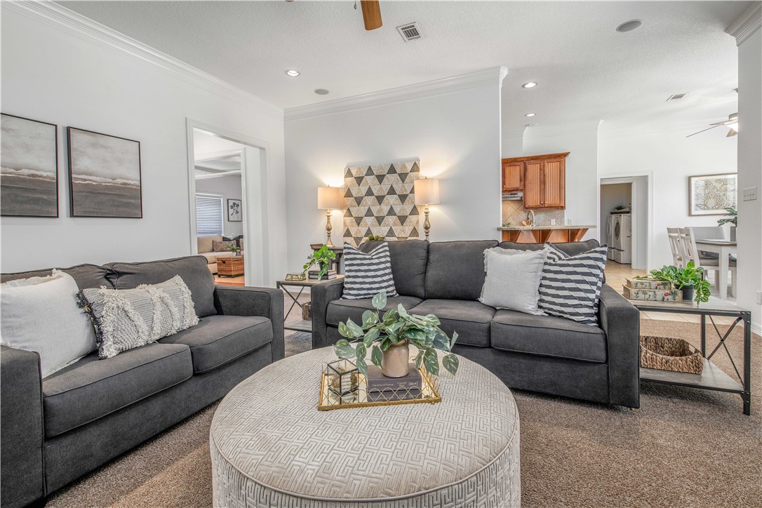406 Cold Spring Drive College Station, TX 77845 - Photo 7 of 32 a living room with furniture and a dining table