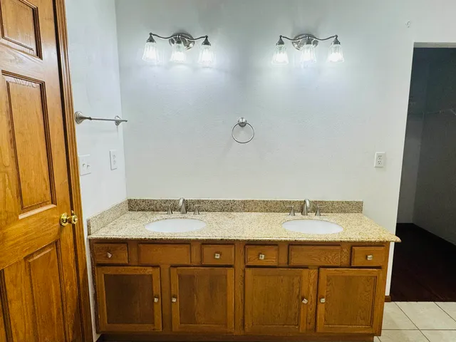 a bathroom with a shower and a toilet
