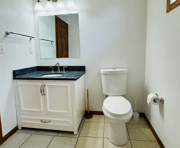 a bathroom with a shower and a bath tub