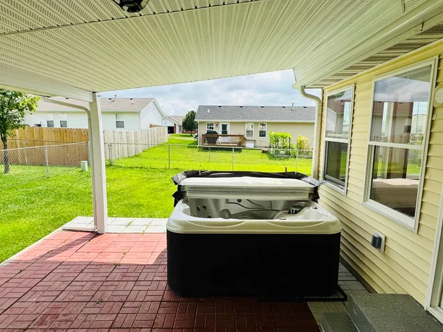 a view of outdoor sitting area with swimming pool
