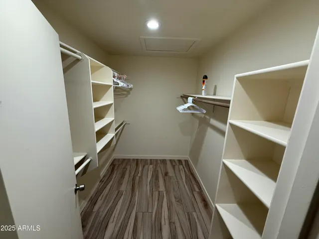 a view of stairs and wooden floor