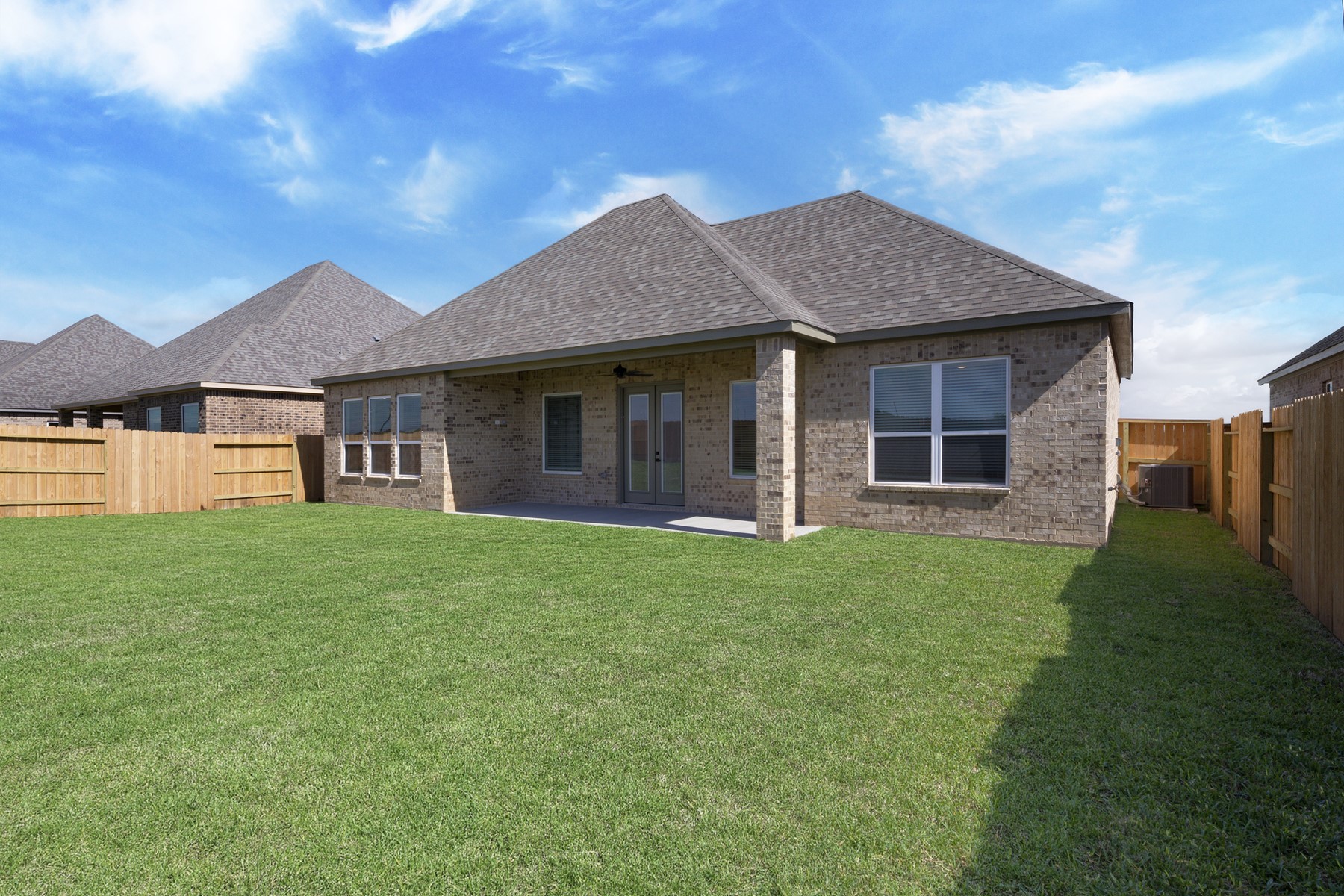 10622 Sutter Crk Drive Rosharon, TX 77583 - Photo 17 of 28 This large back yard continues and has green space for any pets, landscaping, and gardening!
This covered patio with ceiling fan is the perfect place to watch the gorgeous Texas sunset from this stunning backyard!