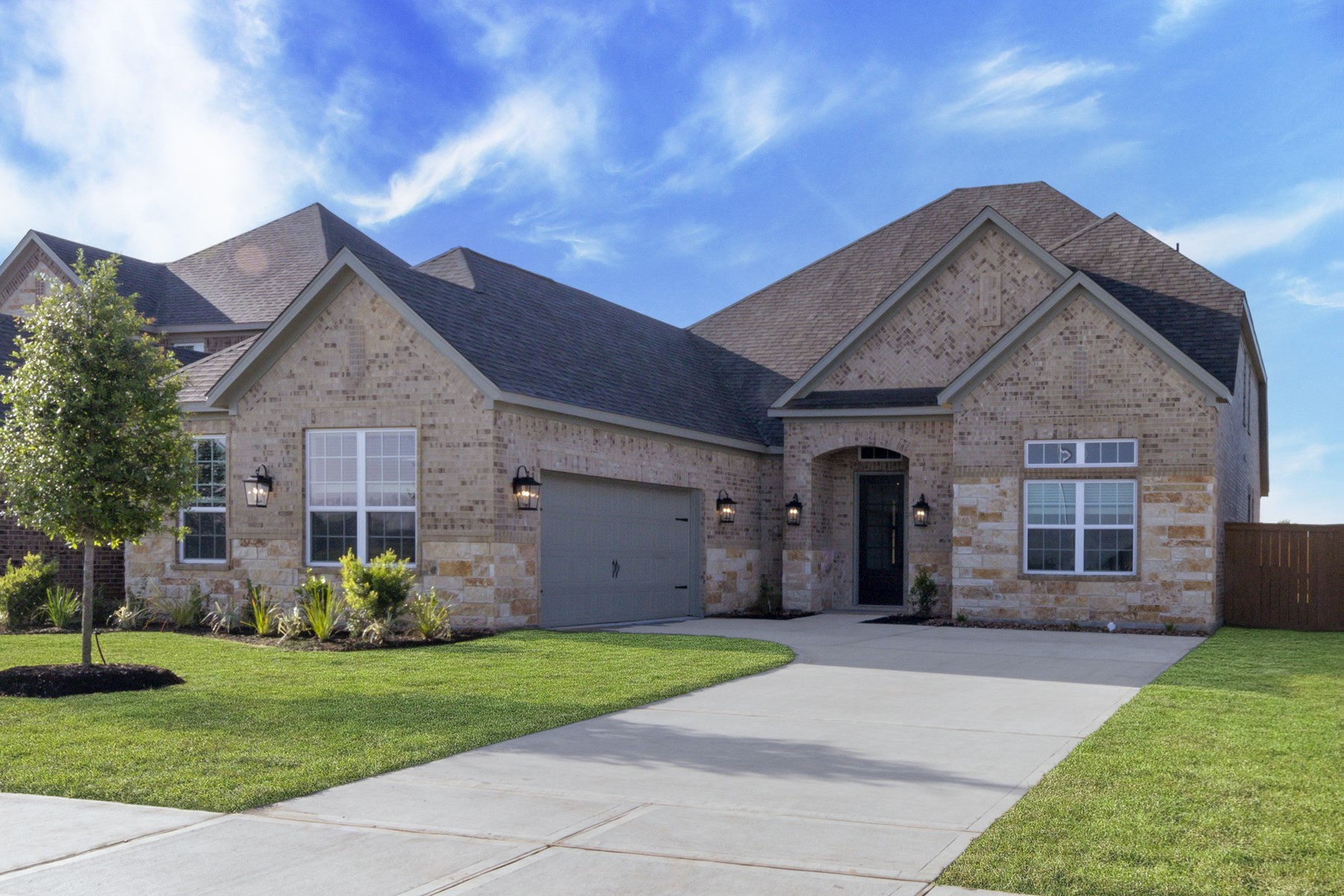 10622 Sutter Crk Drive Rosharon, TX 77583 - Photo 2 of 28 It also boasts a 2-car garage and a long driveway.